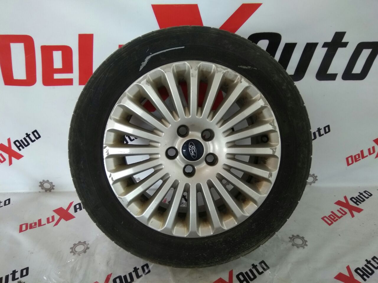 Диск с покрышкой 205/55R16 передний левый